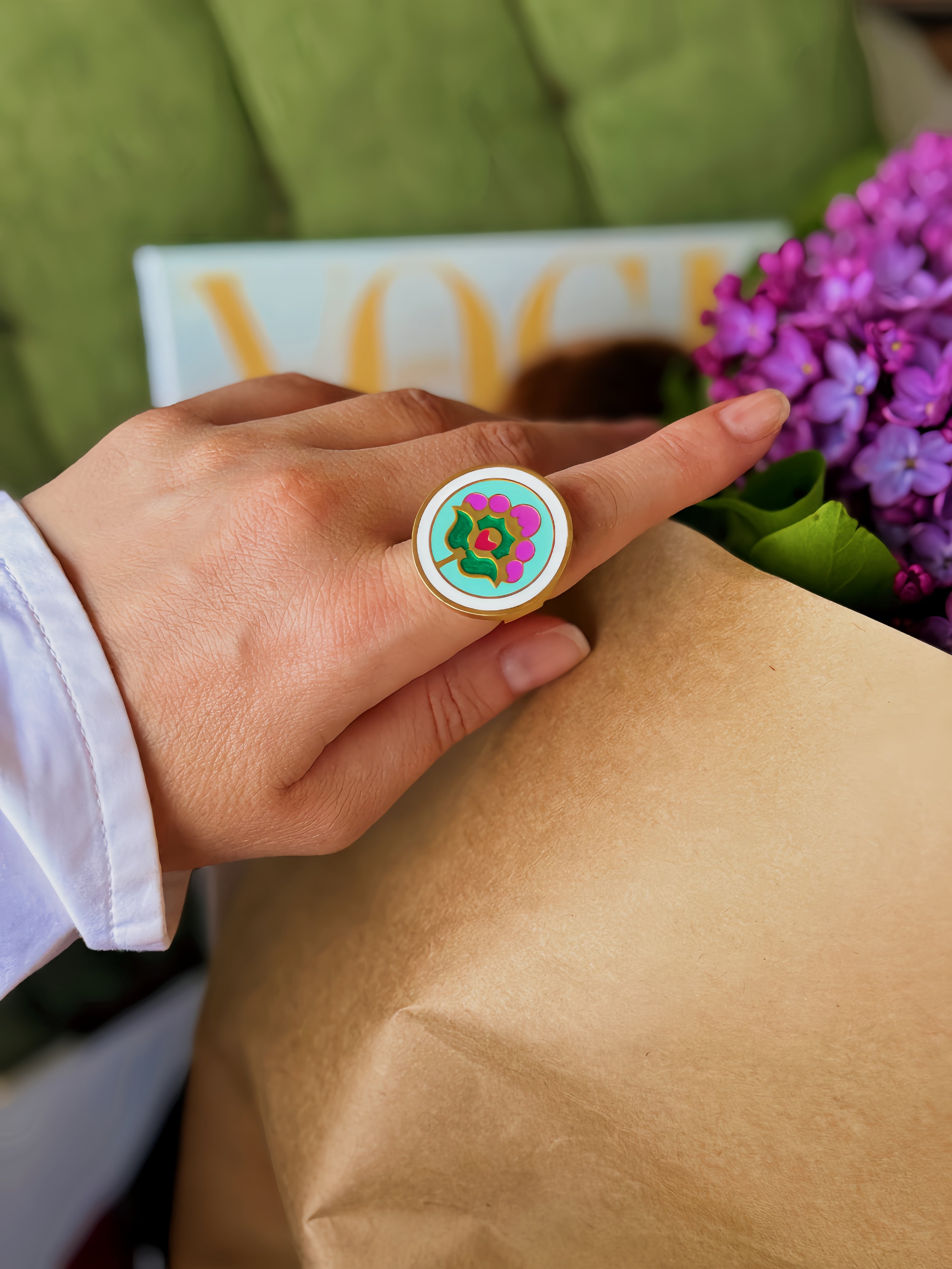 Ring with ornament